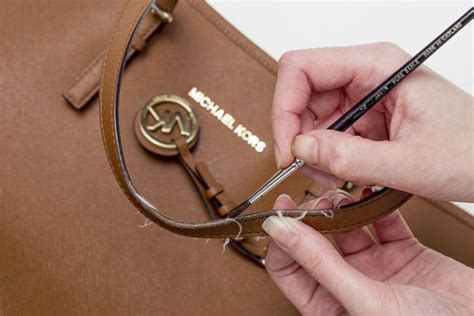 how to remove ink from michael kors purse|Michael Kors handbag cleaner.